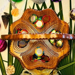 Collapsible wooden hand carved basket from one piece of wood 12”diameter